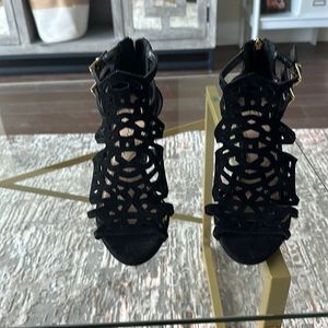 Size 7 black and gold wedges